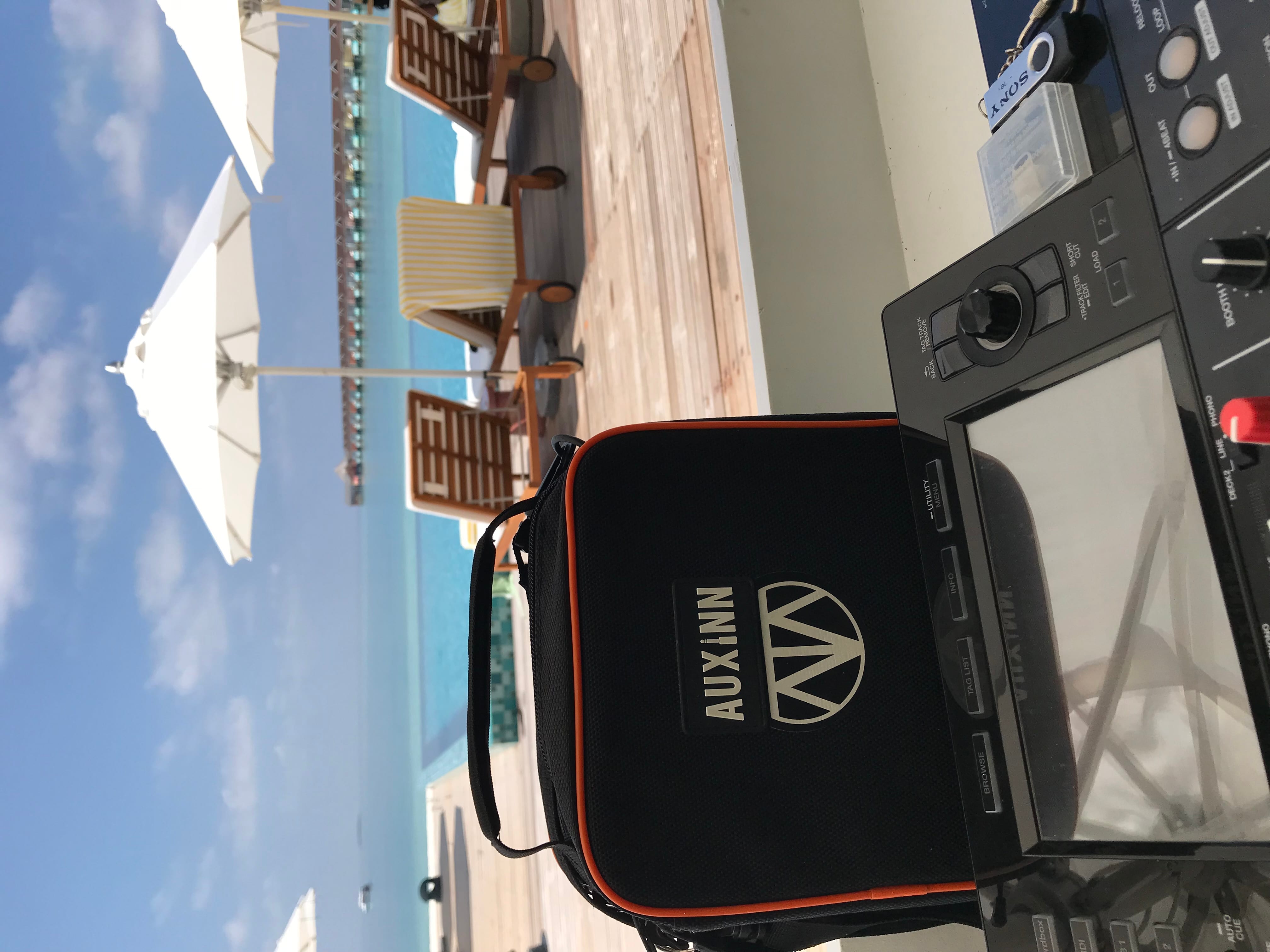 Auxinn bag at a venue install — companion angle